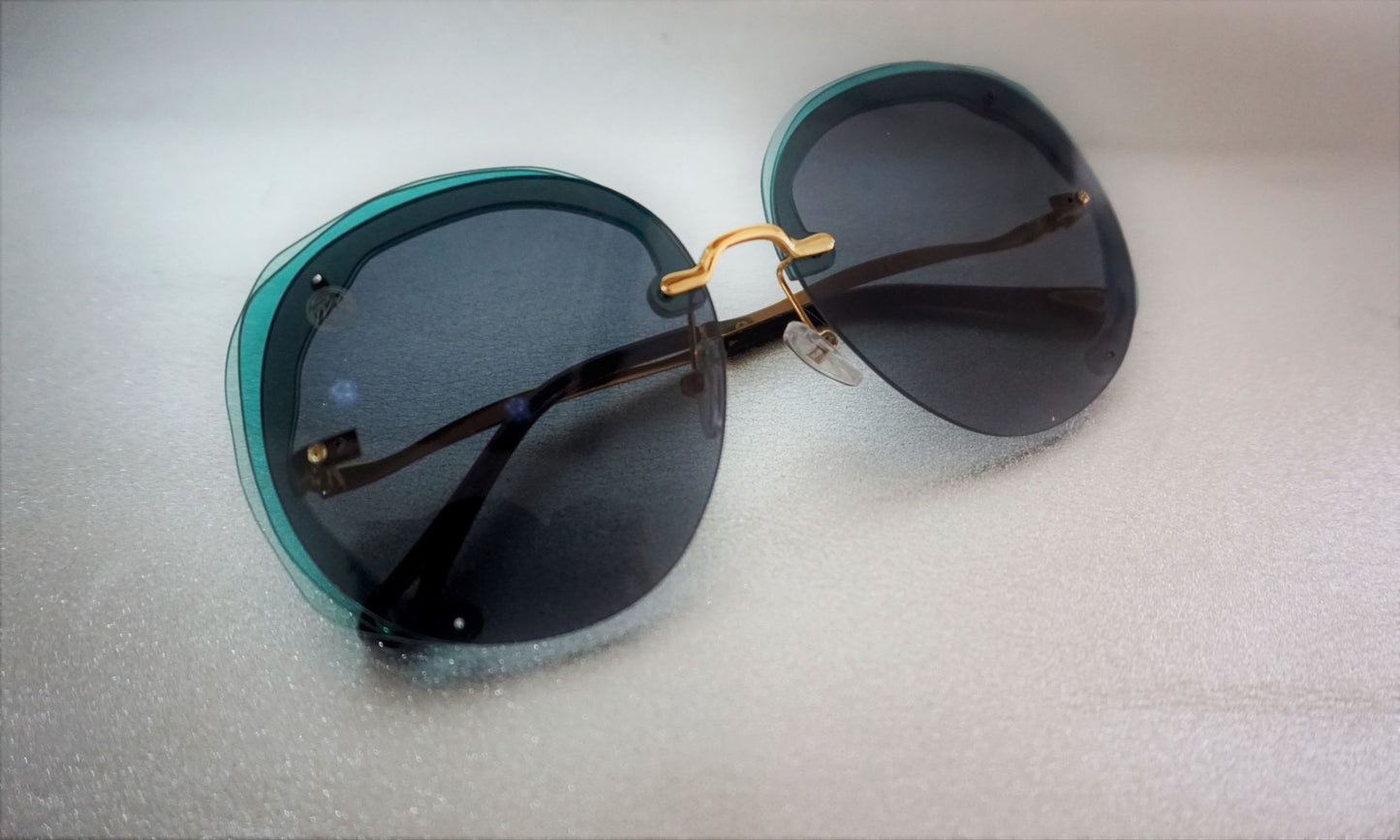 Rimless Gradient Round Sunglasses For Women - Eugenia Molina