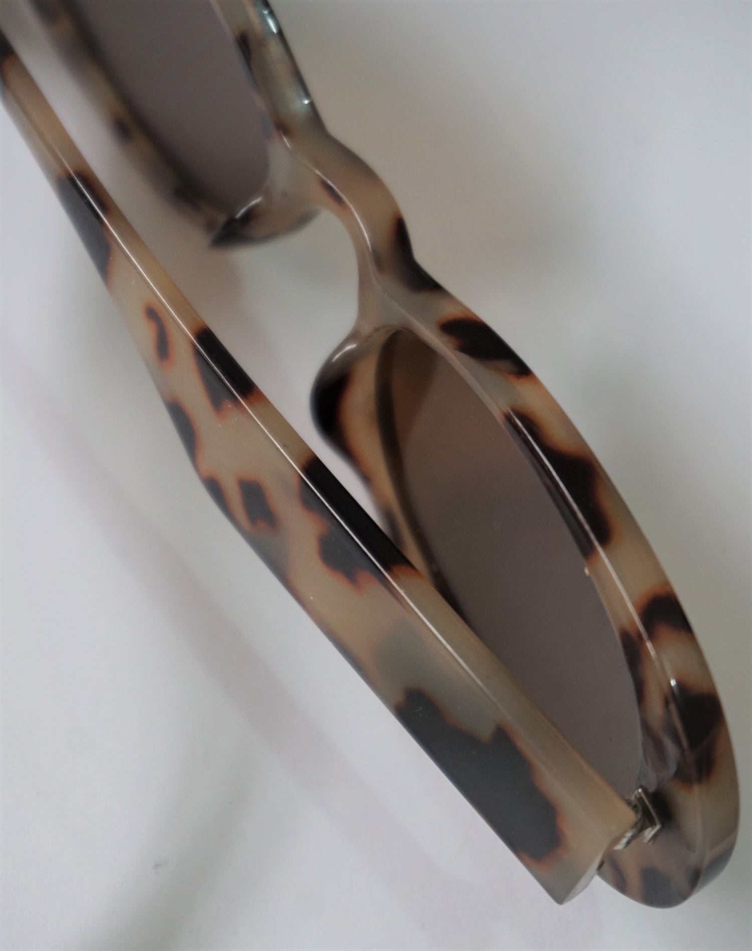 designer Oval Tort Sunglasses - Eugenia Molina