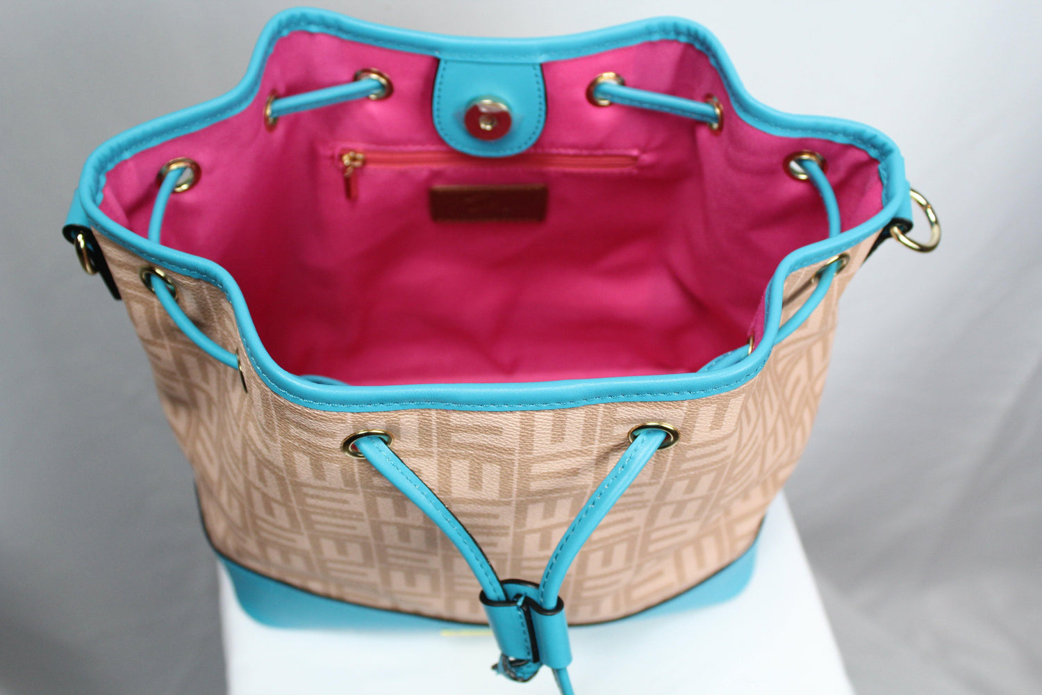 Signature coated canvas with refined calf leather details. Online bags. Free shipping in USA. Find leather, faux leather, printed bags.